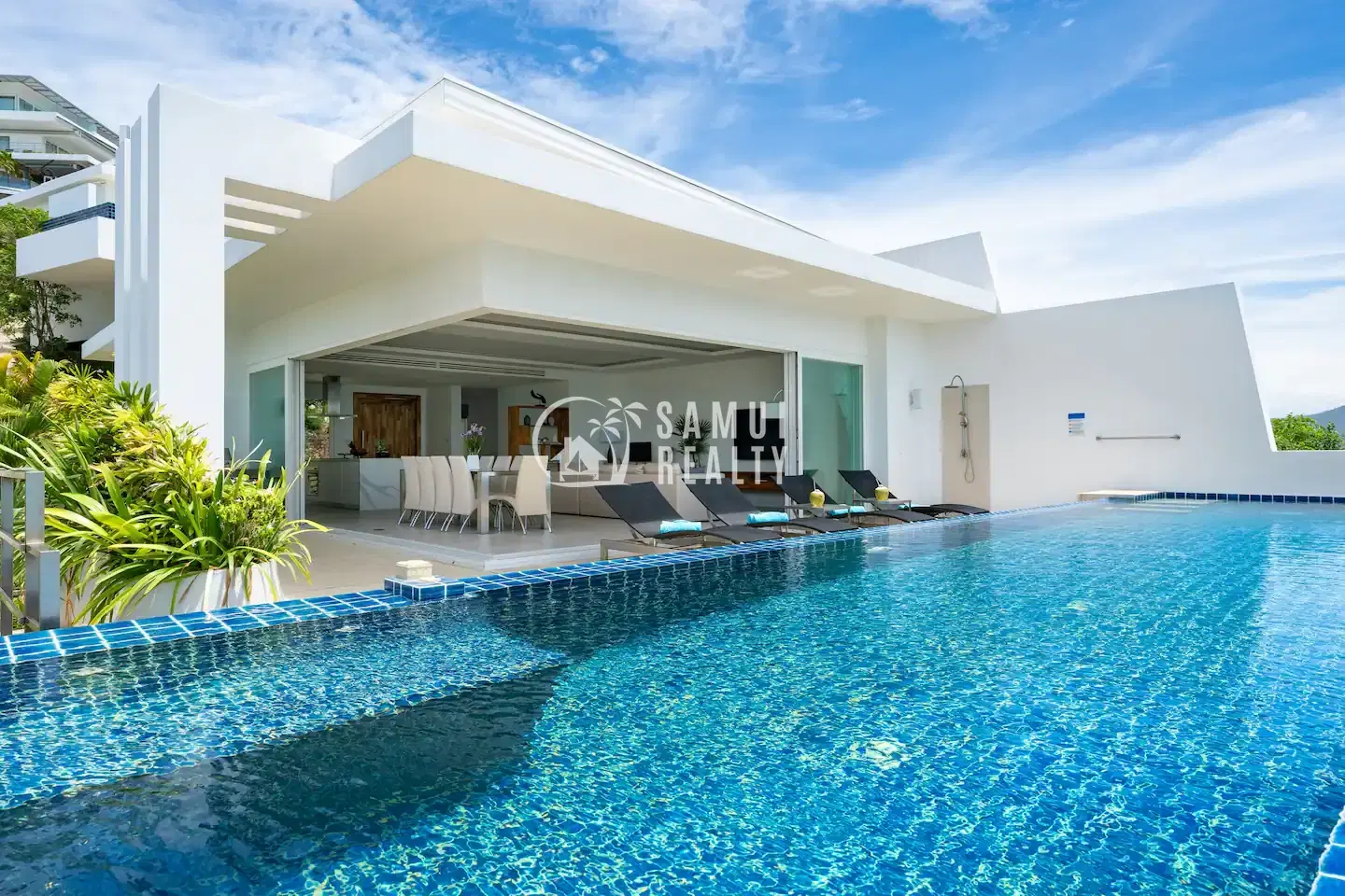 4BR Elevated Elegance: A Tropical Haven